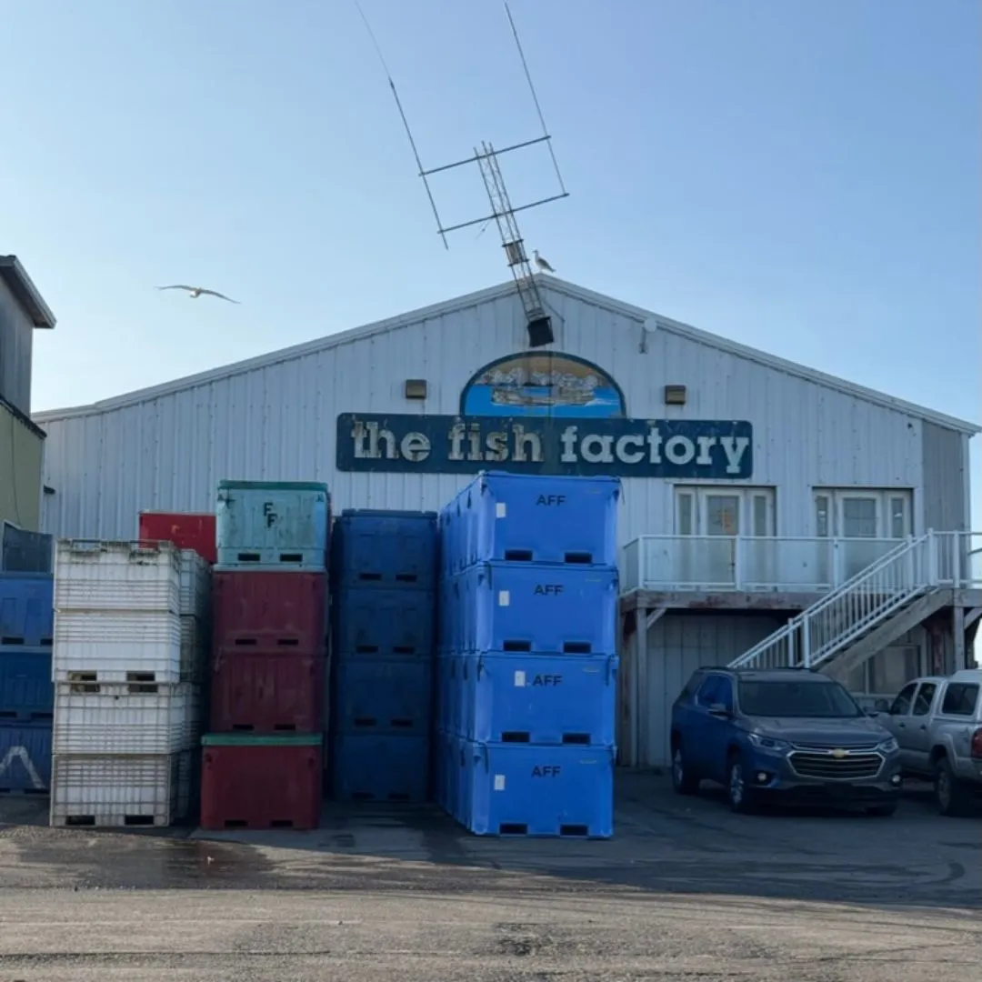 The Alaskan Fish Factory building in Homer, Alaska, with stacked AFF totes