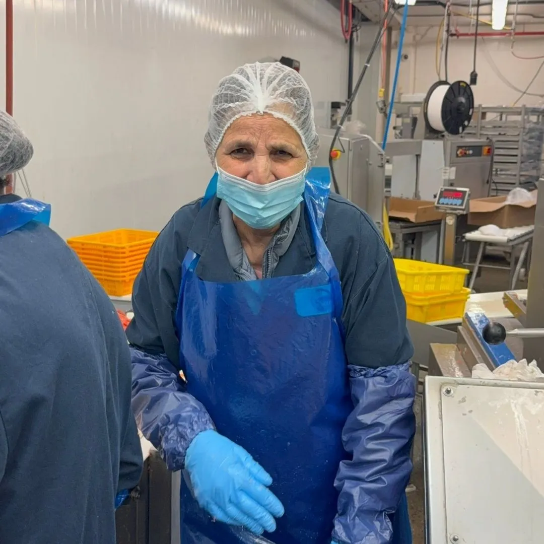The 7 Seas fillet production team smiling for the camera in the Richmond plant