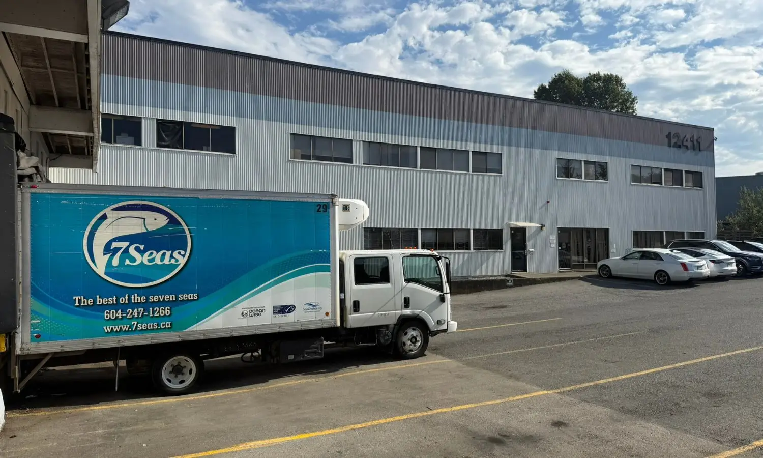 A 7 Seas delivery truck parked in front of the Richmond, BC facility
