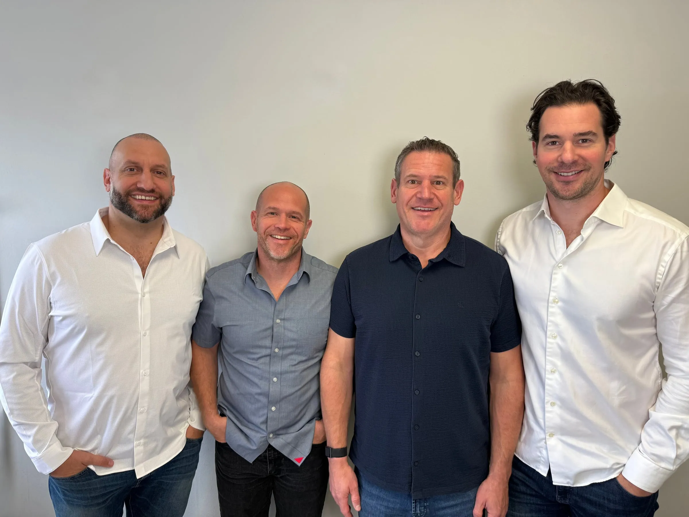 James, Mike, George and Nick Heras standing together at the 7 Seas office