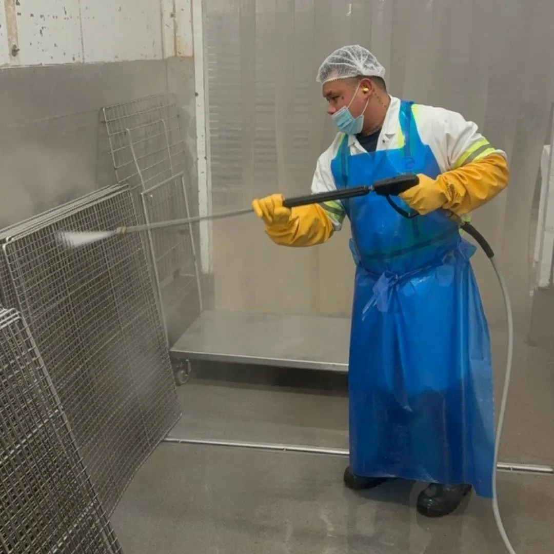 Pressure-washing the production racks