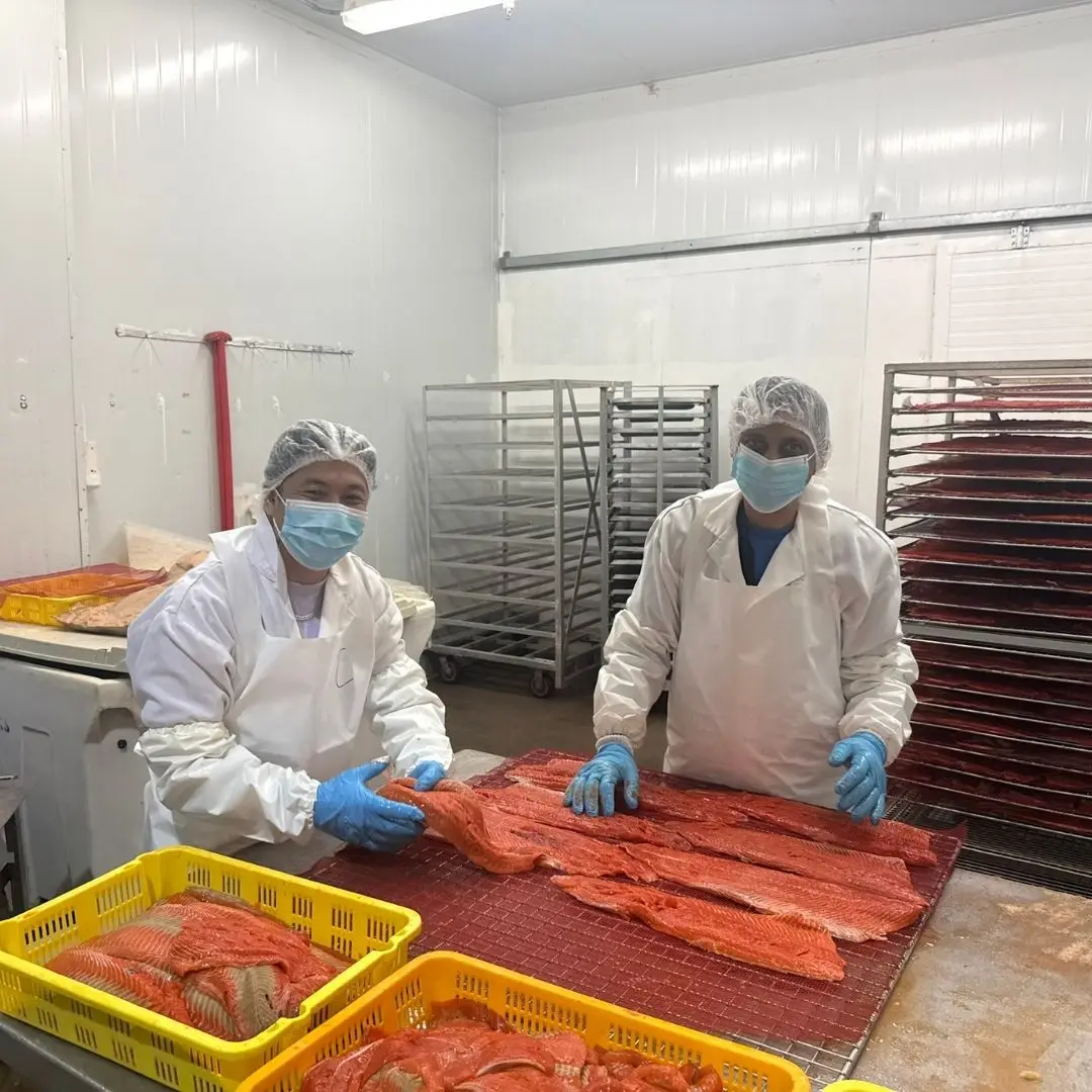 The smoked sockeye production team, ready to add the spice blend before curing and smoking