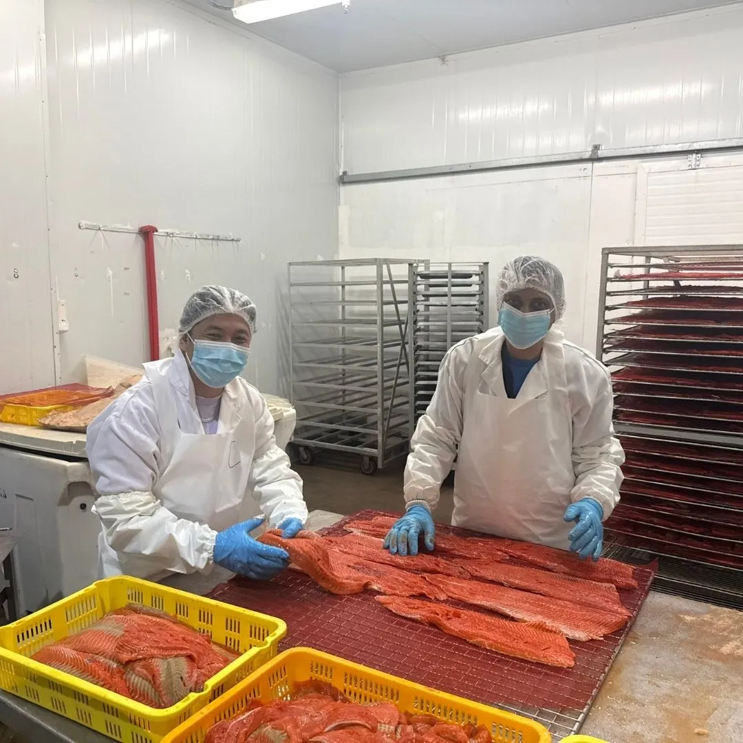 The smoked sockeye production team smiling for the camera